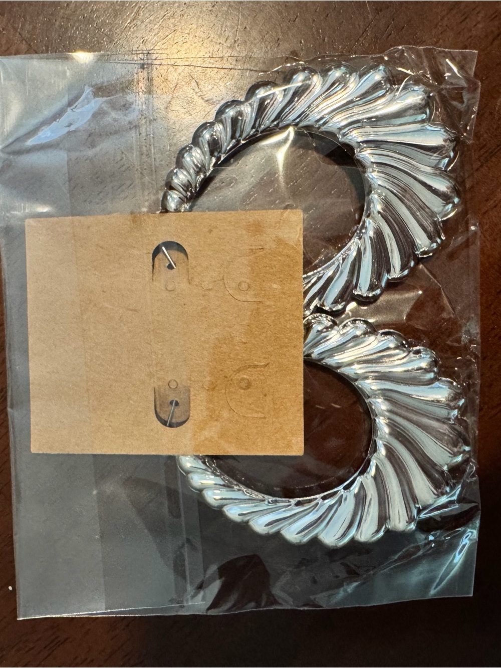 Plunder Silver Swirl Hoop Earrings